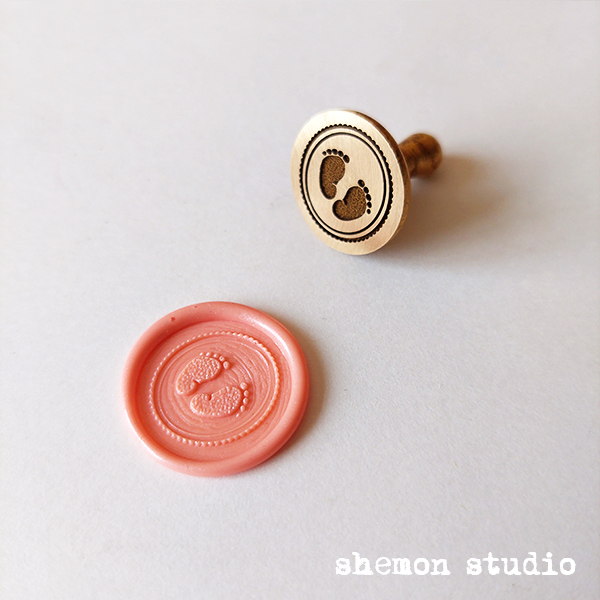 مهر برنجی دو سانتی پای نینی